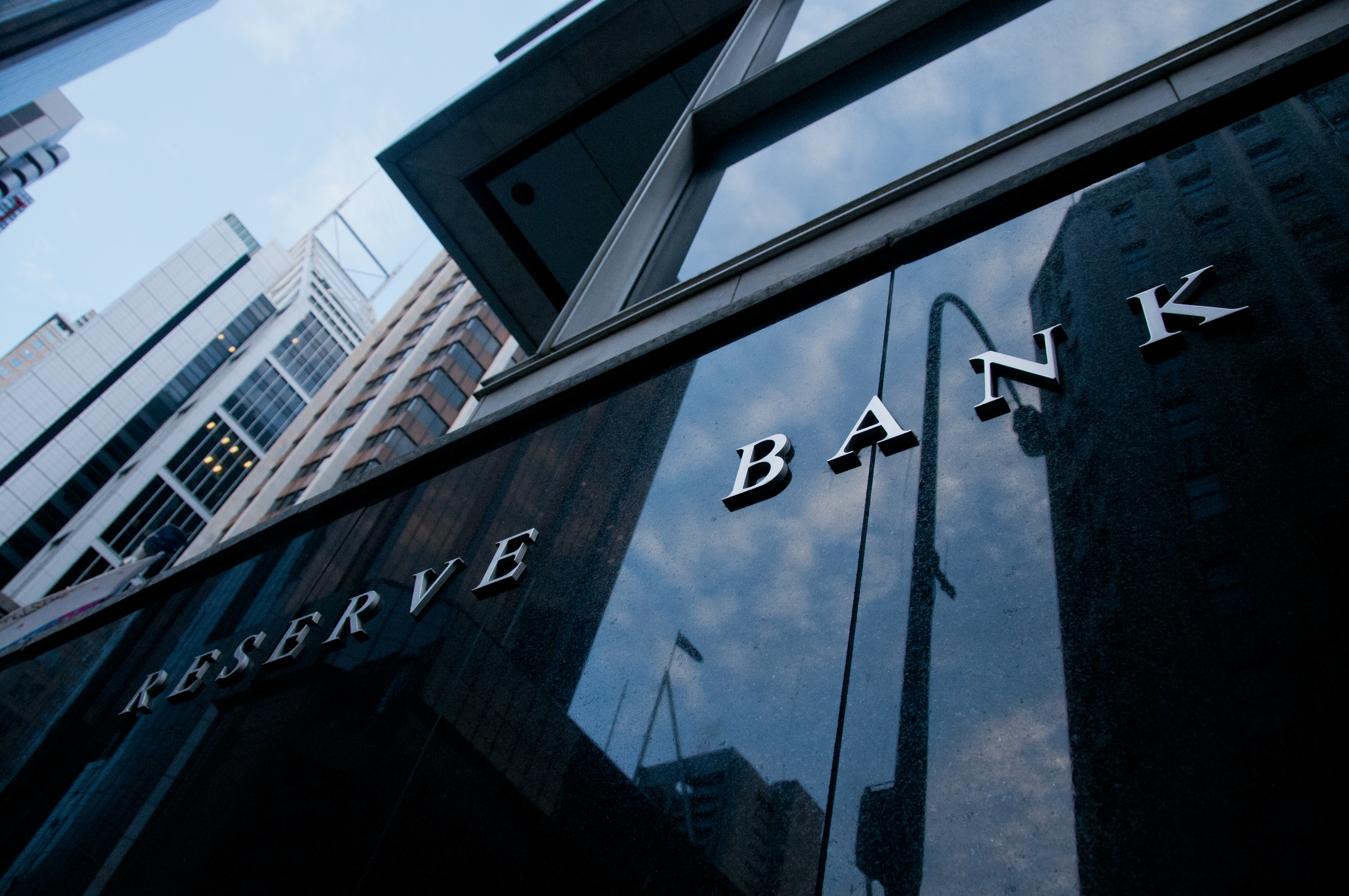 Bank of Australia building name on black stone wall in the center of Sydney.